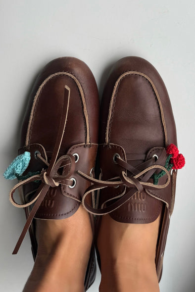 Hand crocheted shoe charm. Loretta Cherry