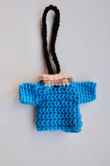 Hand crocheted charm. Blue Jacket