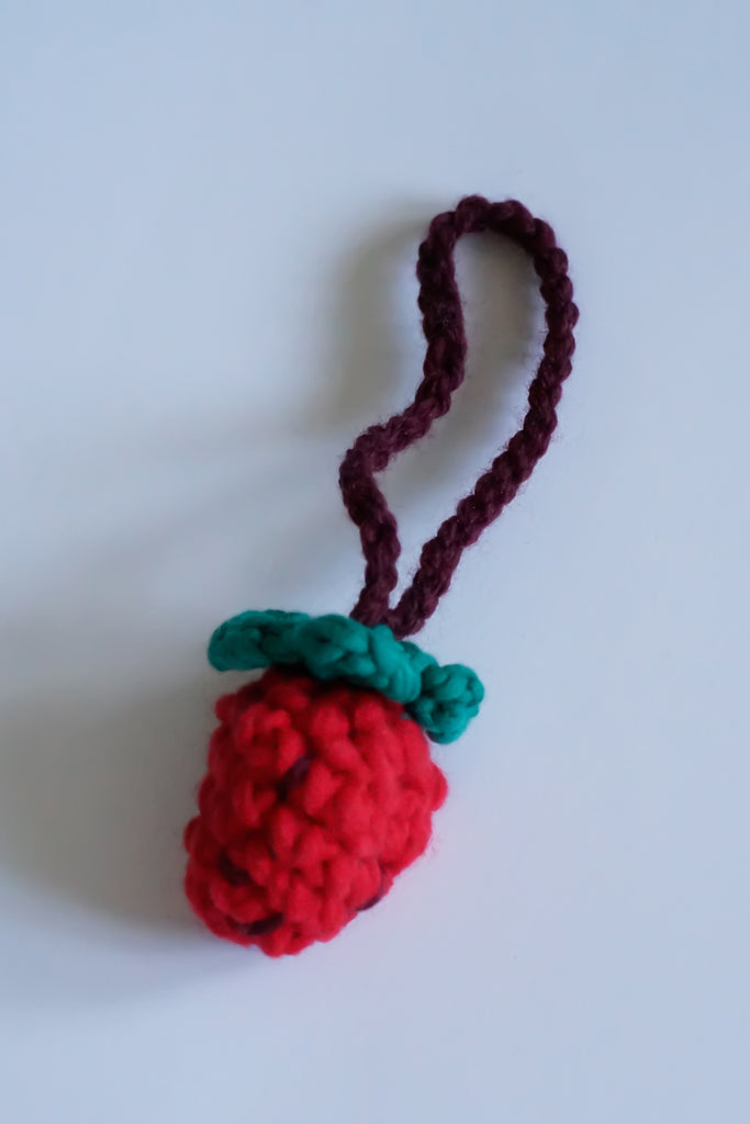 Hand crocheted charm. Strawberry