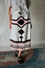 Tailor-made vintage diamond skirt.