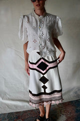 Tailor-made vintage diamond skirt.