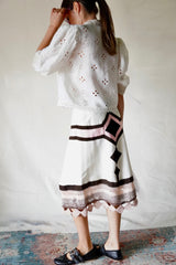 Tailor-made vintage diamond skirt.