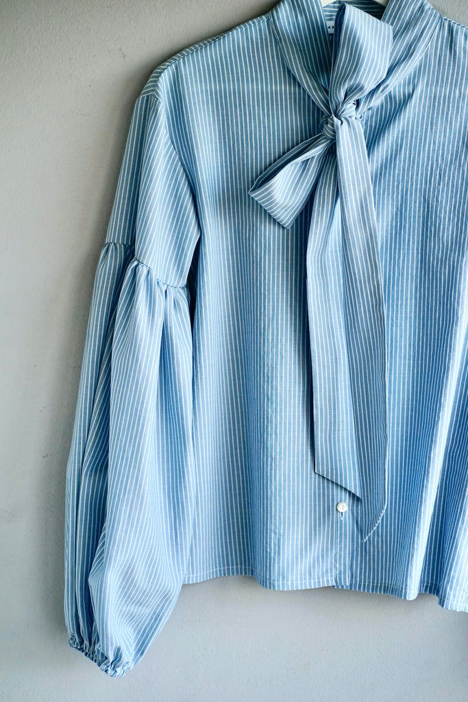 Seville. Bow blouse. Soft blue stripes